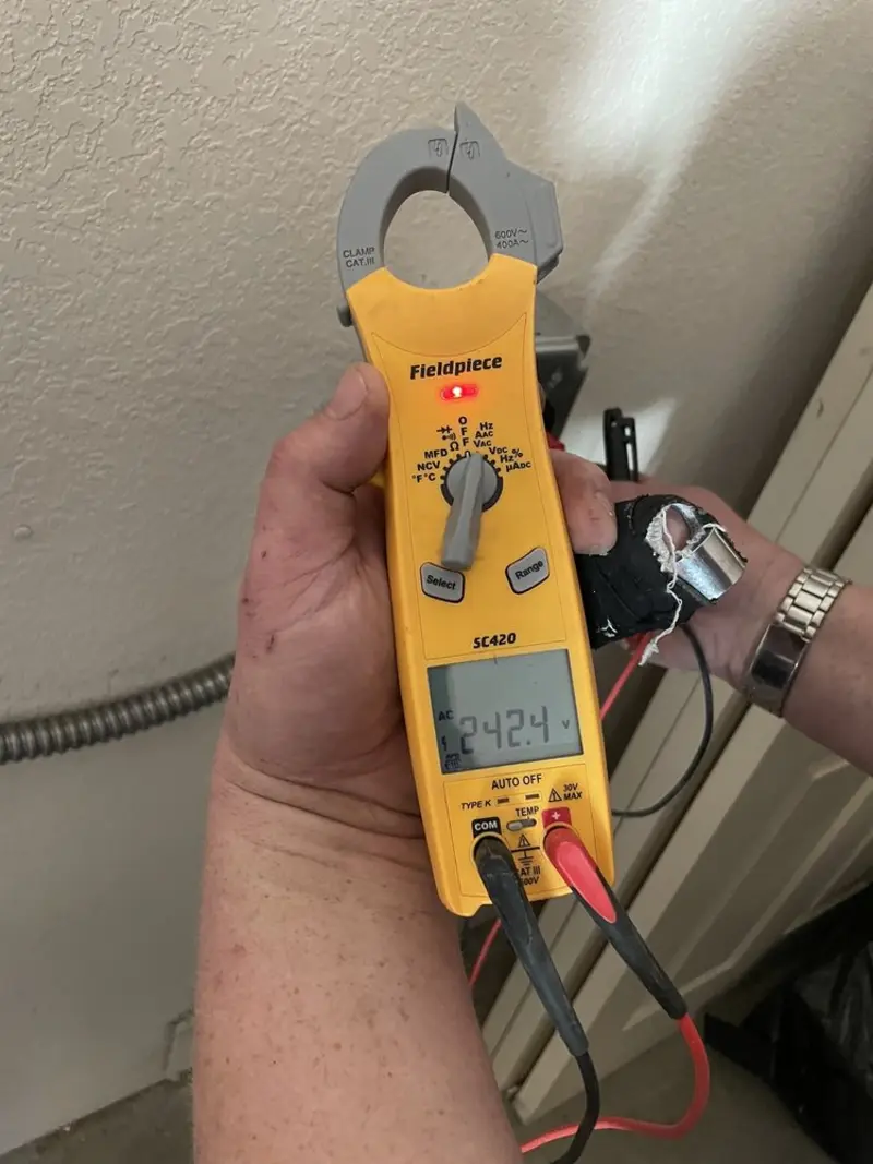 Voltage testing with clamp meter during Hot Tub / Pool Electrical Wiring in Edenton